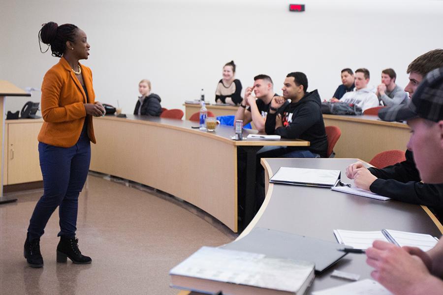 Accounting proffesor giving a lecture to her students